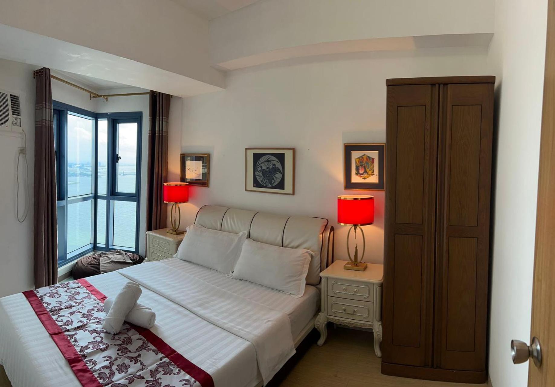 דירות מנילה Sunset House Roxas Bay מראה חיצוני תמונה